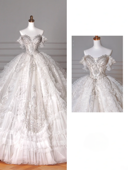Robes de mariée de luxe Robes de bal princesse féérique Épaules dénudées Manches courtes Tulle à volants superposés Traîne Robes de mariée MP063