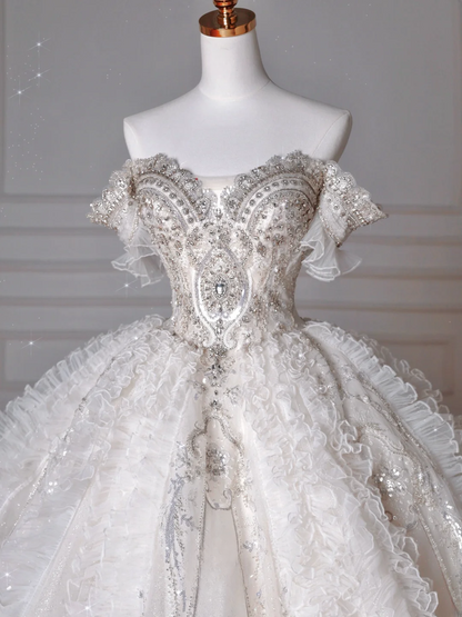 Robes de mariée de luxe Robes de bal princesse féérique Épaules dénudées Manches courtes Tulle à volants superposés Traîne Robes de mariée MP063
