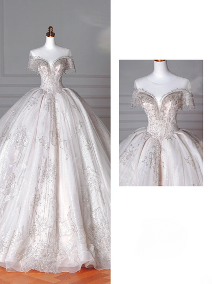 Robes de mariée de luxe Princesses de conte de fées Robe de bal Col bateau Manches courtes Tulle avec perles Traîne de balayage Robes de mariée MP066